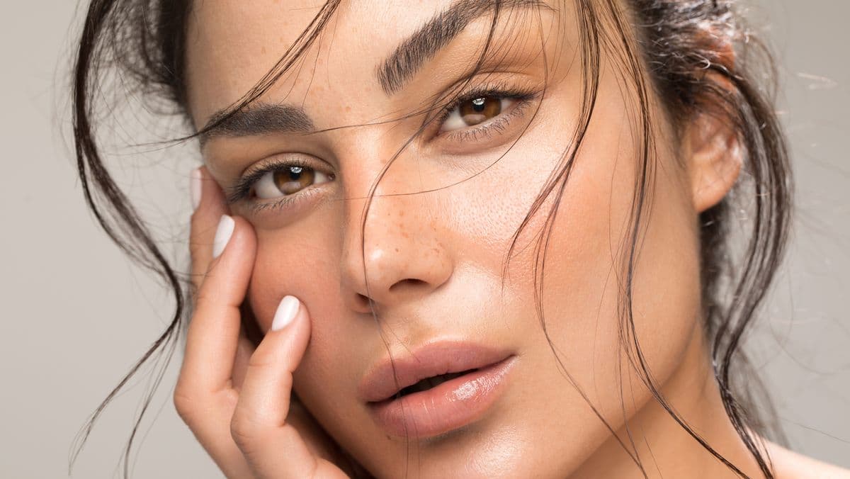 Client with glowing, natural skin at Allure Medical Aesthetics